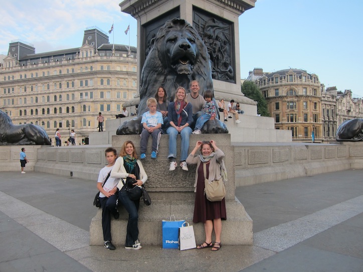 (Almost) the whole family visiting the lions of Trafalgar Square.