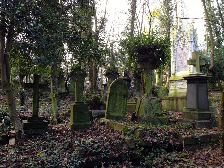 Slowly they're cleaning graves and tombstones, like the gleaming white monument on the right.