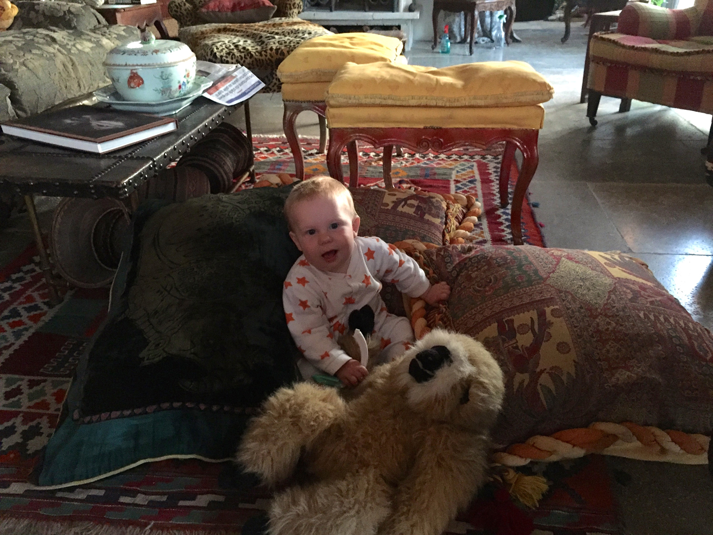 Two monkeys on the floor.