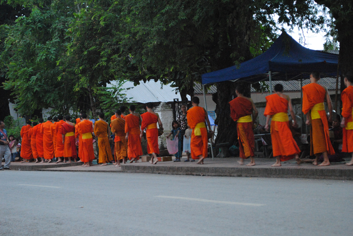Orphans begging from the monks
