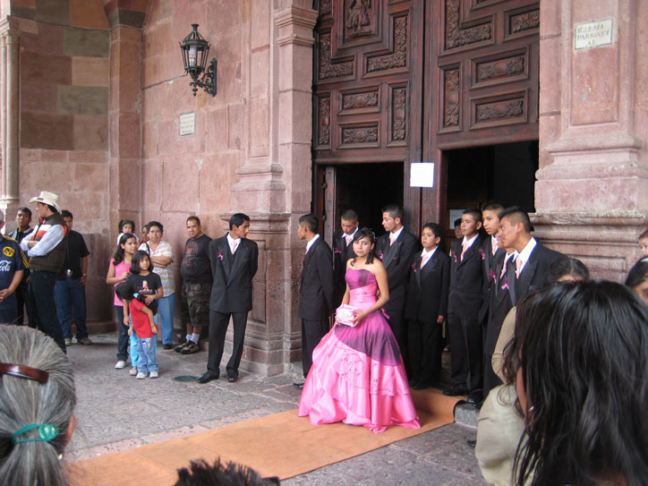 La quinzañera A quinzañera leaving church (quinzañera is the 15th birthday, a very big deal for girls here)