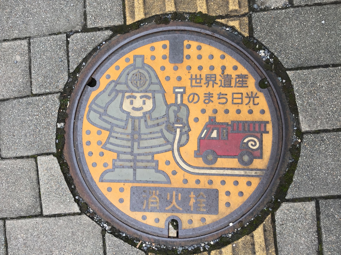 The fireman in Japan get to dress like Samurai, but in blue. Remind me of Where is Wally, blue monks fighting the flames.
